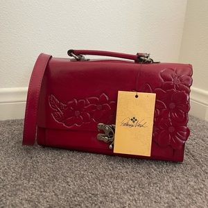 Patricia Nash burgundy/red purse. New with tags!!